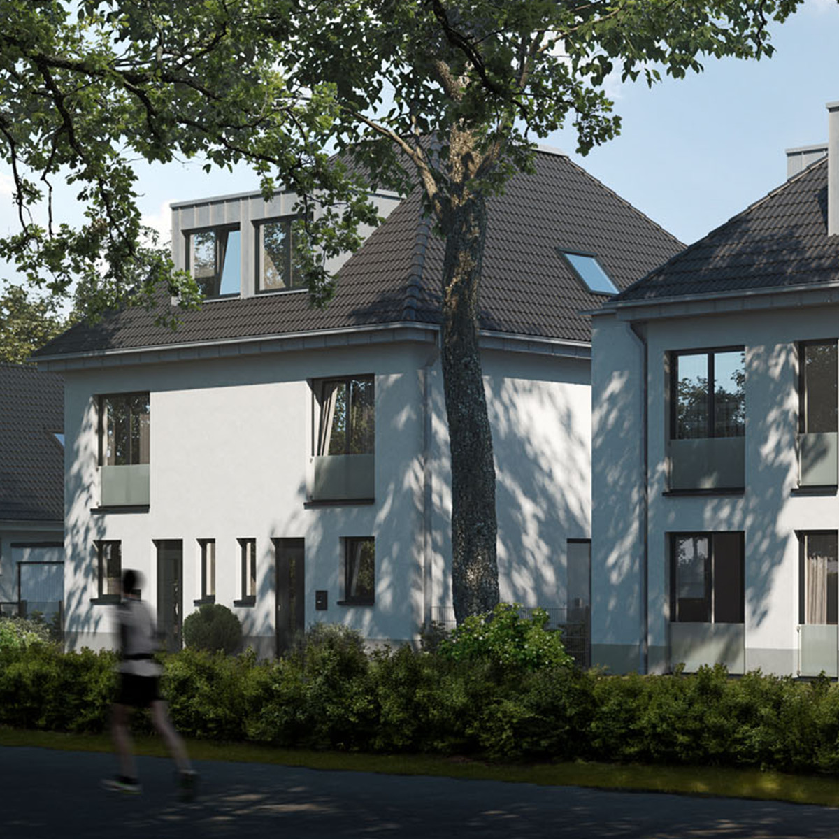 Zwei Häuser nebeneinander von der Straße aus gesehen