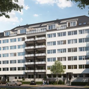 Vorderseite eines Mehrparteien-Wohnhauses mit Balkonen