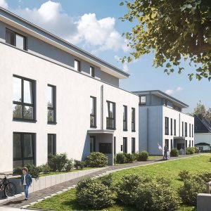 Zwei weiße Mehrfamilienhäuser mit angrenzendem Grünstreifen